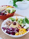 Two Buddha bowls with vegetables, healthy grains, and protein.  Healthy vegetarian salad with buckwheat porridge, corn, avocado Royalty Free Stock Photo