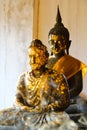Two Buddha with smoke foreground Royalty Free Stock Photo