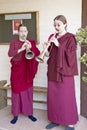 Two Buddhist nuns blow horns at Amitabha Empowerment Buddhist Ceremony, Meditation Mount in Ojai, CA