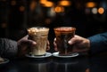 Two buddies share a quiet moment with cups of coffee in hand, business meeting image