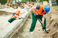 Two builders working