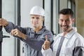 two builders working indoors Royalty Free Stock Photo