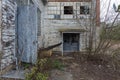 Between two buildings of an abandoned factory complex