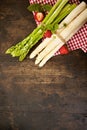 Two bundles of fresh raw green and white asparagus Royalty Free Stock Photo