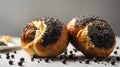 Two buns with poppy seeds close-up on a white background