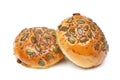 Two buns with pumpkin seeds and sesame seeds on the top Royalty Free Stock Photo