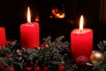 Two burning advent candles. Christmas candlestick. Royalty Free Stock Photo