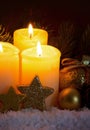 Two burning advent candles and Christmas decoration. Royalty Free Stock Photo