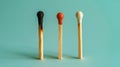 Two burning matches on pastel blue background, ideas, emotional burnout, teamwork. Generative AI Royalty Free Stock Photo