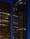 Two business buildings in Frankfurt at night. Royalty Free Stock Photo