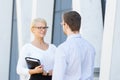 Two business colleagues going home after work Royalty Free Stock Photo