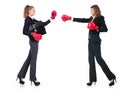 Two business ladies boxing isolated on white Royalty Free Stock Photo