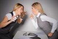 Two business ladies having a fight Royalty Free Stock Photo