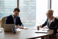 Two business male and woman meeting in office Royalty Free Stock Photo