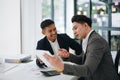 Two business men meeting to talking or discuss marketing work in workplace using paperwork, calculator, computer to work Royalty Free Stock Photo