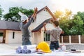 Two business man professional engineer worker at the house building