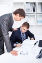 Two business men signing papers Royalty Free Stock Photo