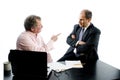 Two business partners at desk disagreement Royalty Free Stock Photo