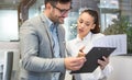 Two business partners discussing issues at a meeting in an office. Royalty Free Stock Photo