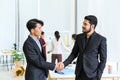 Two business partners shake hands after concluding a business finished in the office. Business to succeed concept, Collaborative Royalty Free Stock Photo