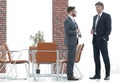 Two business executives talking about business in the office. Royalty Free Stock Photo