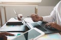 Two business partnership coworkers discussing a financial planning graph and company during a budget meeting in office room Royalty Free Stock Photo