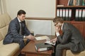 Two business people direct negotiations in the office Royalty Free Stock Photo