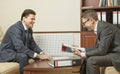 Two business people direct negotiations in the office Royalty Free Stock Photo
