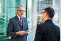 Two business people discussing outdoor Royalty Free Stock Photo