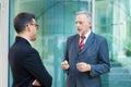 Two business people discussing outdoor Royalty Free Stock Photo