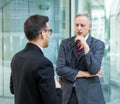 Two business people discussing outdoor Royalty Free Stock Photo