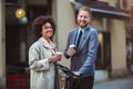 Two business people in an informal conversation Royalty Free Stock Photo