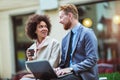 Two business people in an informal conversation Royalty Free Stock Photo