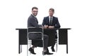 Two business people talking sitting at a Desk Royalty Free Stock Photo