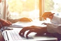 Two business people teamwork working near window in office room