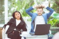 Two business surprised looking at laptop computer with shocked Royalty Free Stock Photo