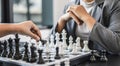 Two business women competitors playing chess board game, business competition concept, business plan to be the number one company Royalty Free Stock Photo