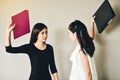 Two business women have conflicts in the workplace, they are hit Royalty Free Stock Photo