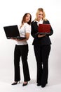 Two Business Women Standing with Laptops Royalty Free Stock Photo