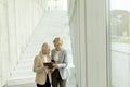 Business women walking in the office corridor Royalty Free Stock Photo