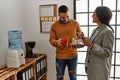 Two business workers relaxed drinking coffee at the office Royalty Free Stock Photo