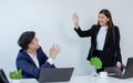 Two business workers wearing formal suits and waving their hands Royalty Free Stock Photo