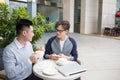 Two businessman having a casual meeting or discussion in the cit Royalty Free Stock Photo