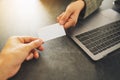 Two businessman holding and exchanging empty business card Royalty Free Stock Photo