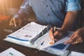 Two businessman planning strategy on desk with paperwork, Strategist team analyze data or information Royalty Free Stock Photo