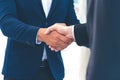 Two businessman shake hand for the first meeting. Two business people greeting outdoor