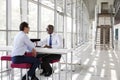 Two businessman shake hands during a meeting Royalty Free Stock Photo