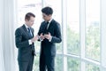 Two businessman talking with mobile phone Royalty Free Stock Photo