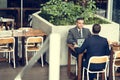 Two Businessmen Cafe Meeting Laptop Concept Royalty Free Stock Photo