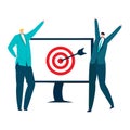 Two businessmen celebrating success in front of a target with a bullseye and dart. Office workers achieving goals and Royalty Free Stock Photo